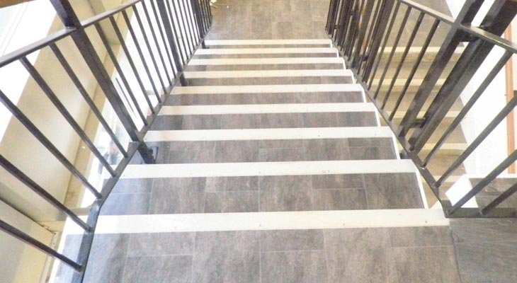 School hallway stairs flooring.