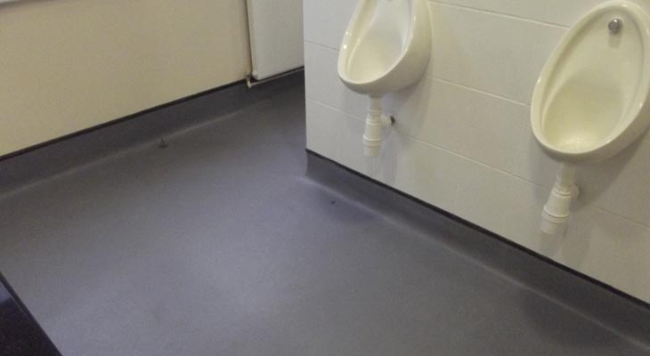 Safety flooring in school toilet.