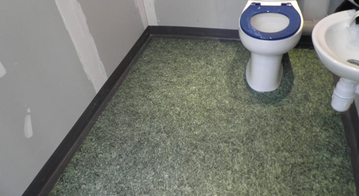 Vinyl safety flooring in toilet.