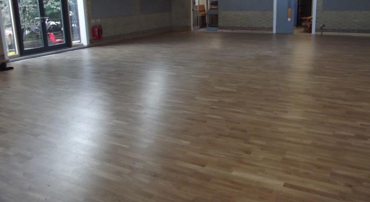 Wood flooring in sports hall.