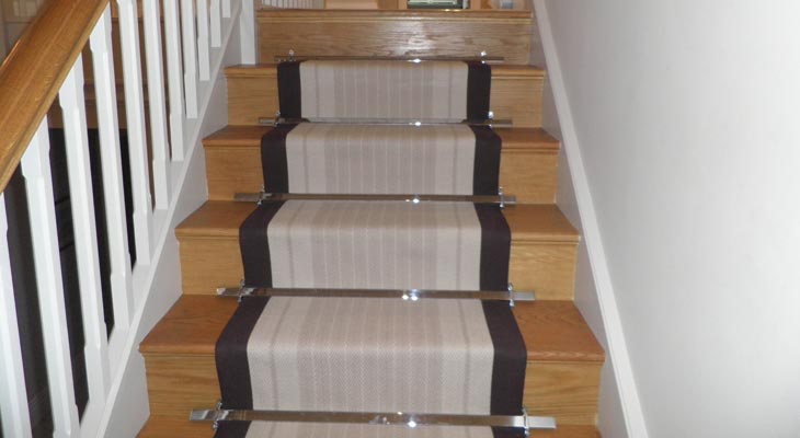 Hartley and Tissier flatweave carpet stair runner.